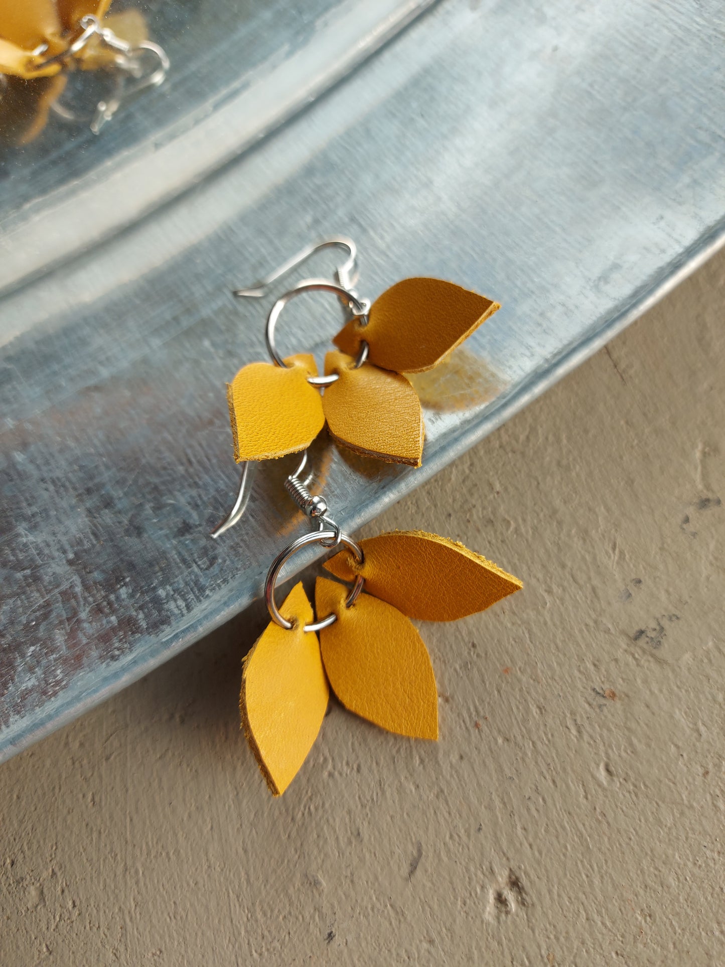 Three Leaves leather earring